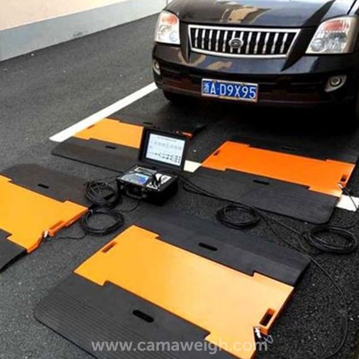 Vehicle weighing solutions with portable wheel scales by HKM